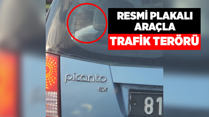 Kucağında Çocukla Yoğun Trafikte Seyretti